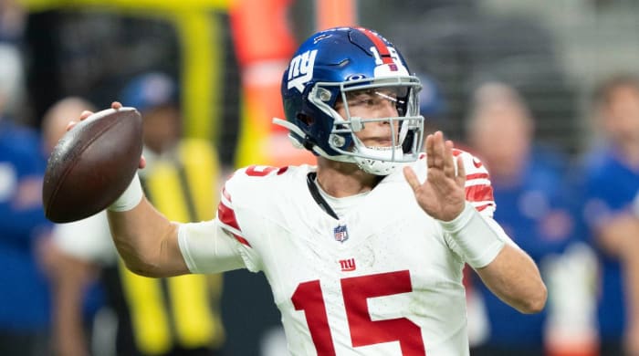 Tommy DeVito looks to throw against the Las Vegas Raiders.